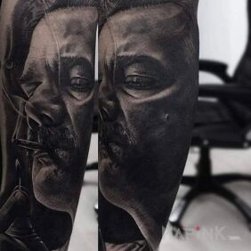 Tattoo Pablo Escobar on the forearm motif: faces style: realistic