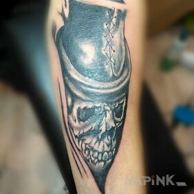 Tattoo Dziara M on the forearm motif: skulls