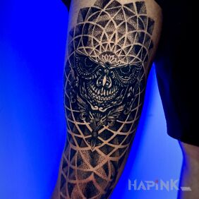 Tattoo Skull with ornament on the thigh motif: skulls style: geometric