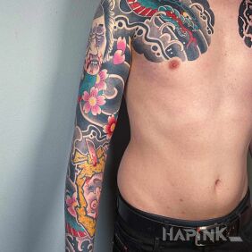Tattoo Japanese style sleeve on the bicep motif: faces style: japanese / irezumi