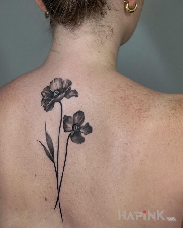 Tattoo Maki in floral motif and realistic style on the back