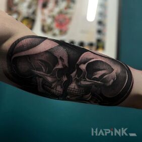 Tattoo Skulls On the arm motif: anatomical style: realistic
