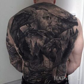Tattoo Ragnar on the back motif: characters style: realistic