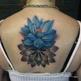 Tattoo Water lily with mandala on the back motif: mandalas style: realistic