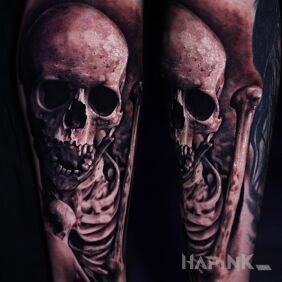 Tattoo Skeleton On the arm motif: dark style: realistic