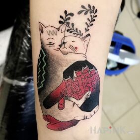 Tattoo Cats on the forearm motif: animals