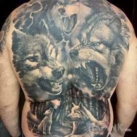 Tattoo Wolves on the shoulder blades motif: nature style: realistic