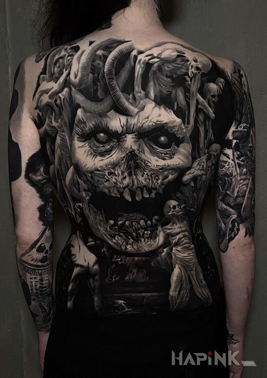 Tattoo Czaszunia in black and gray motif and realistic style on the shoulder blades