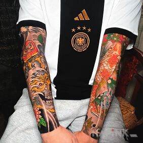 Tattoo Japanese full of colors On the arm motif: animals style: japanese / irezumi