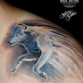 Tattoo Wolf tattoo on the shoulder motif: animals style: realistic