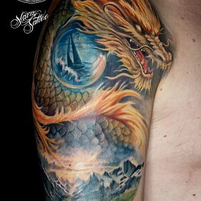Tattoo Colorful dragon cover up On the arm motif: colorful style: realistic
