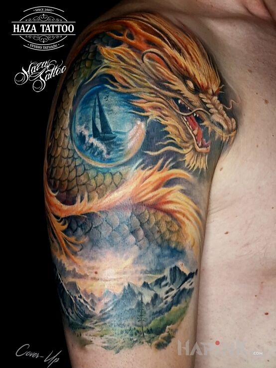 Tattoo Colorful dragon cover up in fantasy motif and realistic style on the shoulder