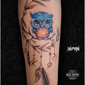 Tattoo Color owl tattoo on the forearm motif: animals style: graphic / illustrative