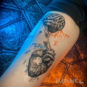 Tattoo Brain vs Heart On the arm motif: anatomical style: graffiti