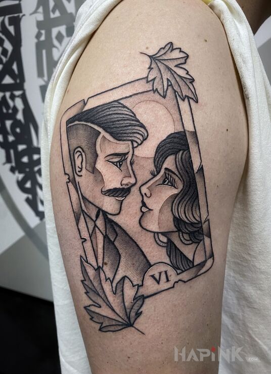 Tattoo The lovers in characters motif and oldschool style On the arm