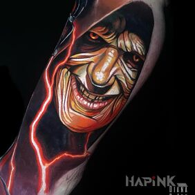 Tattoo Palpatine Star Wars on the bicep motif: dark style: realistic