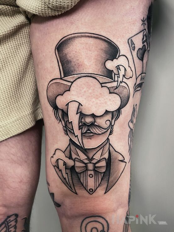 Tattoo Oldschool getleman in faces motif and graphic / illustrative style on the leg