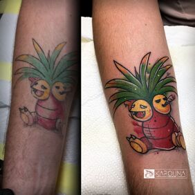 Tattoo Tattoo Revival On the arm motif: cover-up style: cartoon / comic book