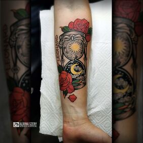 Tattoo The Passage of Time on the forearm motif: cosmos style: oldschool