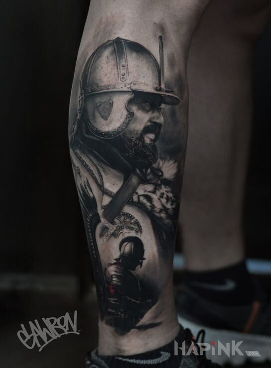 Tattoo Husaria in characters motif and realistic style on the leg
