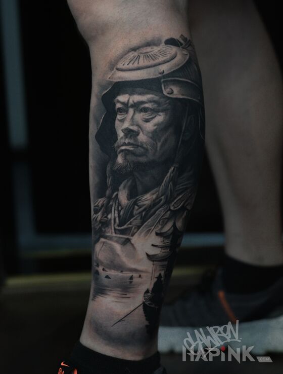Tattoo Japoński dziadek in black and gray motif and realistic style on the calf