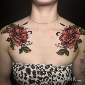 Tattoo Symmetrical flowers by an apprentice on the chest motif: colorful style: neo-traditional