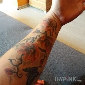 Tattoo Flowers on the forearm motif: flowers