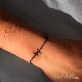 Tattoo Barbed wire on the wrist motif: Prison