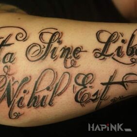 Tattoo Life without freedom is nothing on the forearm motif: lettering
