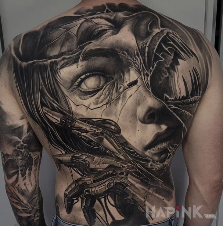 Tattoo Plecy. Twarz. Kobieta. in black and gray motif and realistic style on the shoulder blades