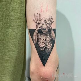 Tattoo Pan's Labyrinth on the upper arm style: graphic / illustrative