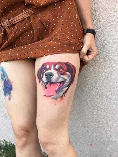 Tattoo Piesek in animals motif on the leg