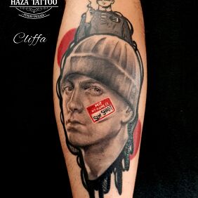 Tatuaż Eminem tatuaż kolor na łydce motyw: kolorowe styl: realistyczne