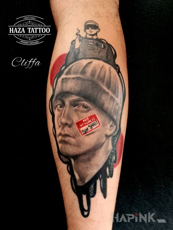 Tattoo Eminem color tattoo in faces motif and realistic style on the calf