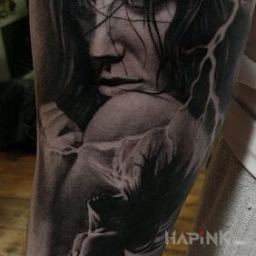Tattoo Grim woman on the forearm motif: faces style: realistic