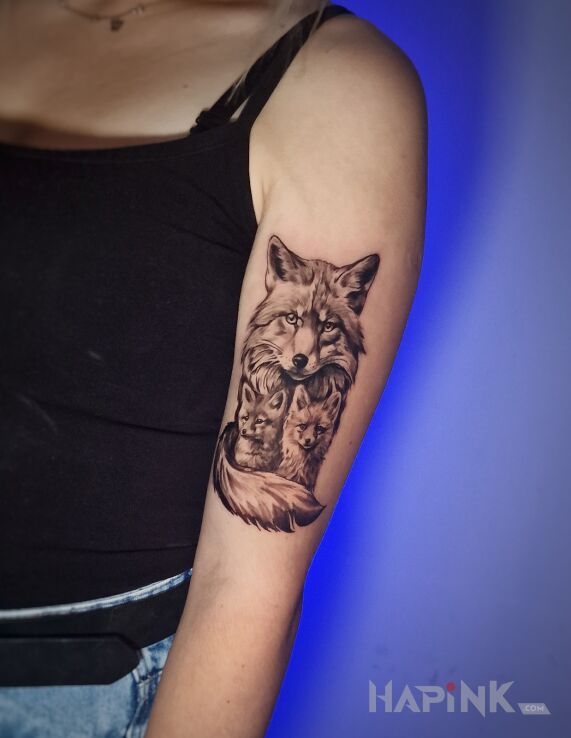 Tattoo Liski in animals motif and realistic style On the arm
