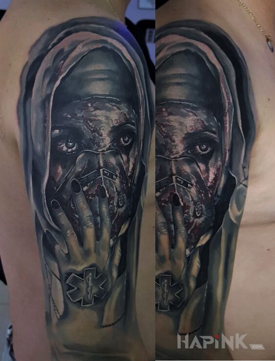 Tattoo Koniec Rękawa :) in faces motif and realistic style on the upper arm