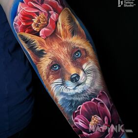 Tattoo Fox flowers On the arm motif: animals style: realistic