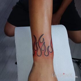 Tattoo Firee on the wrist motif: colorful style: oldschool