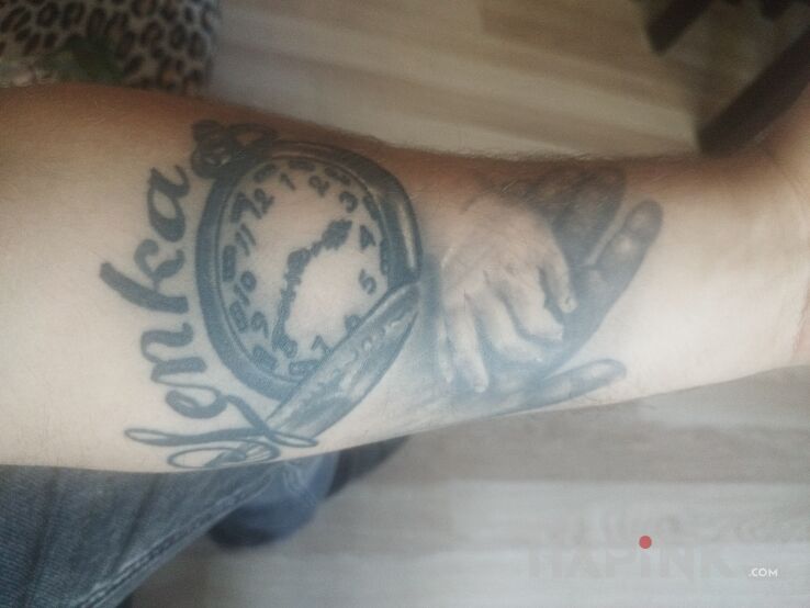 Tattoo Imię córki in objects motif and realistic style On the arm