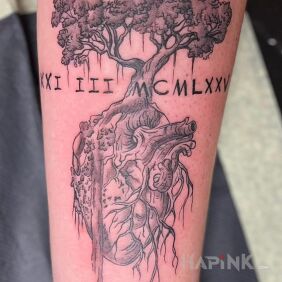 Tattoo Heart with nature on the forearm motif: anatomical style: graphic / illustrative