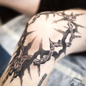 Tattoo Penitent Tattoo on the leg motif: religious style: graphic / illustrative