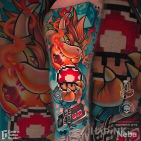 Tattoo Bowser Mario Bros Tattoo on the upper arm motif: colorful style: cartoon / comic book