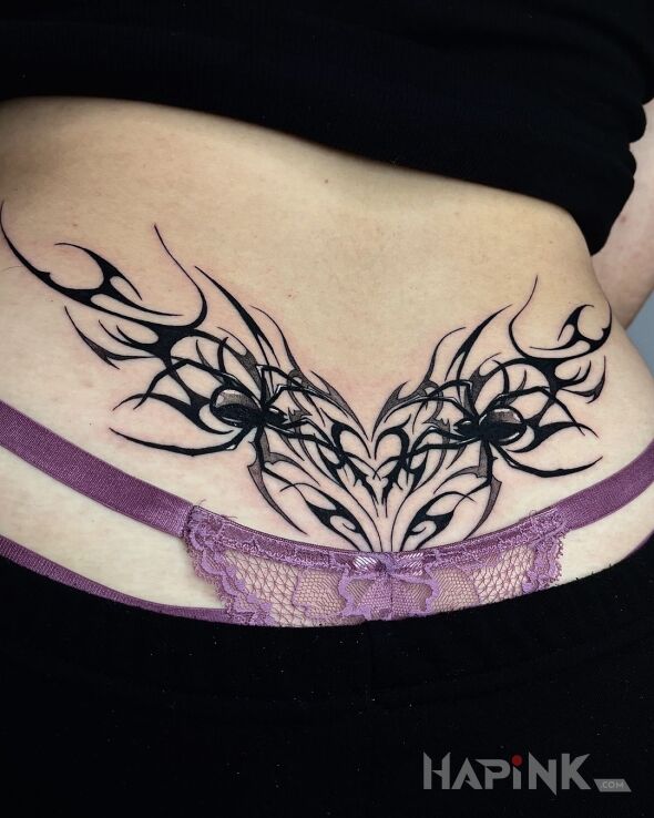 Tattoo Sercowy tribalek in other motif and tribal style on the back