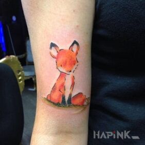 Tattoo Little fox on the forearm motif: animals style: Watercolor