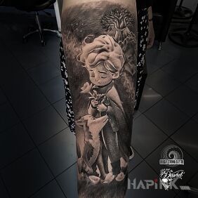 Tattoo The Little Prince and the Fox On the arm motif: black and gray style: graphic / illustrative