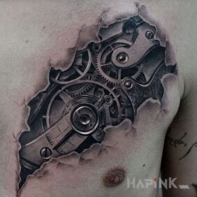 Tattoo Cogs and cogs on the chest motif: 3D style: biomechanics
