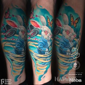 Tattoo White rabbit Alice in Wonderland on the leg motif: fantasy style: surrealistic