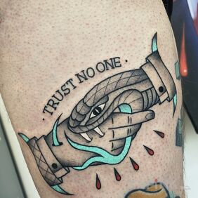 Tattoo Oldschool Trust no one On the arm motif: colorful style: graphic / illustrative