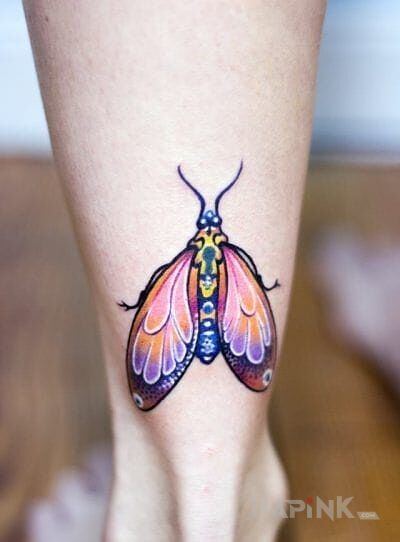 Tattoo Kolorowy motyl in butterflies motif on the leg